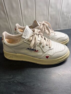 Autry Women's Medal Heart Leather Sneakers in Off-White with Red Accent
